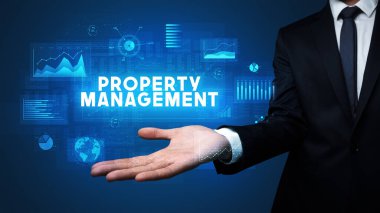 Motivasyon mesajı taşıyan iş adamının eli