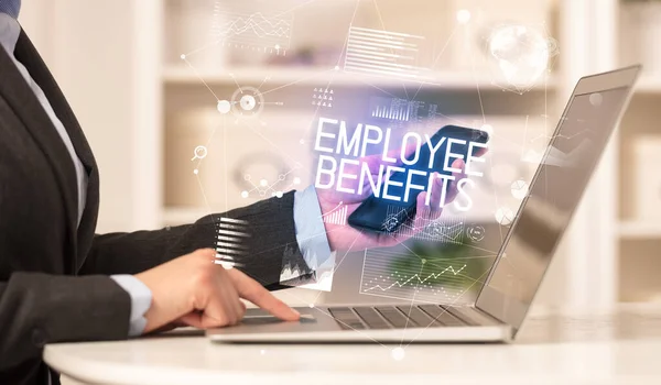 Side view of a business person working on laptop — Stock Photo, Image