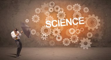 Şemsiye konseptiyle savunma yapan iş adamı