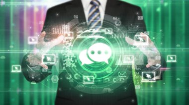 Teknoloji simgesi taşıyan iş adamı