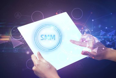 Hand holdig futuristic tablet concept