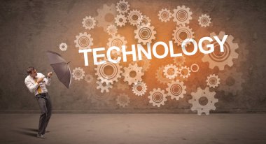 Şemsiye konseptiyle savunma yapan iş adamı