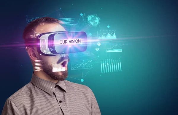 Businessman looking through Virtual Reality glasses — Stock Photo, Image