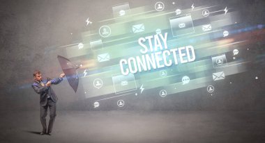 Şemsiye konseptiyle savunma yapan iş adamı