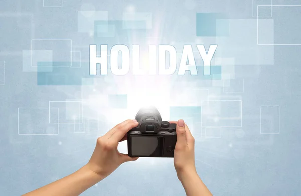 Hand houden digitale camera, reizen concept — Stockfoto