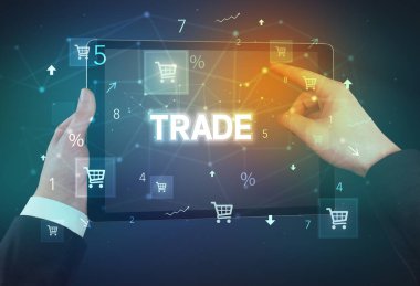 Alışveriş yazısıyla el ele tutuşma tabletinin yakın çekimi