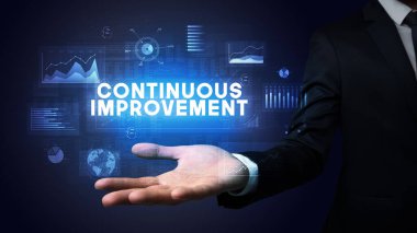 Motivasyon mesajı taşıyan iş adamının eli