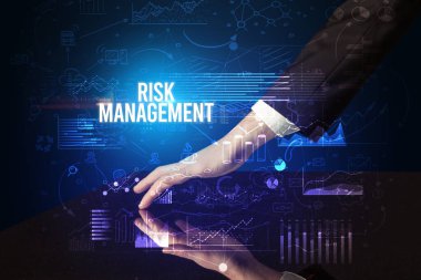 Businessman touching huge screen concept