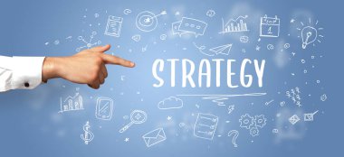 İşletme yazıtlarına işaret eden kırpılmış elin yakın çekimi