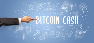 İşletme yazıtlarına işaret eden kırpılmış elin yakın çekimi