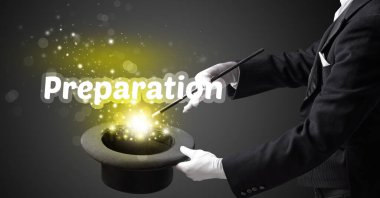 İllüzyonist sihir numarası yapıyor.