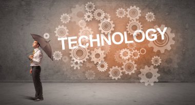 Şemsiye konseptiyle savunma yapan iş adamı