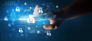 Doktor el, ekranda tıbbi sembollü fütüristik sağlık aygıtı kullanıyor.