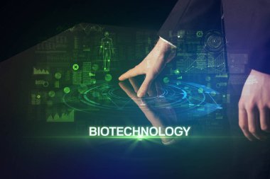 Businessman touching huge display concept