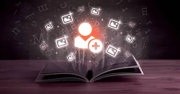 Open book with social networking icons above — Stock Photo, Image