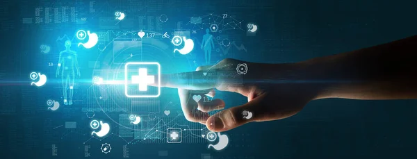 Médico de la mano presionando dispositivo de salud futurista con símbolo médico en la pantalla — Foto de Stock