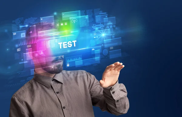 Businessman looking through Virtual Reality glasses — Stock Photo, Image