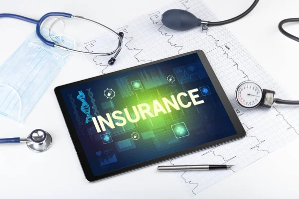 Tablet bilgisayar ve tıbbi malzemeler.