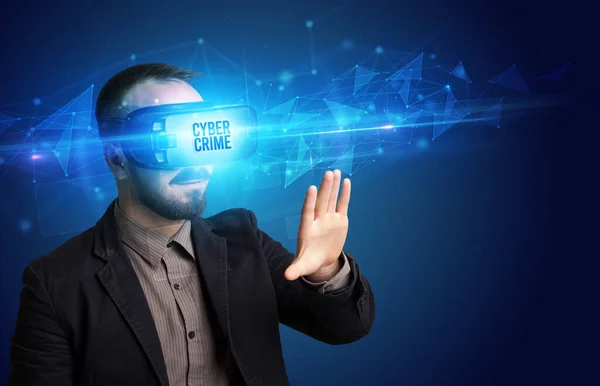 Businessman looking through Virtual Reality glasses, virtual security concept — Stock Photo, Image