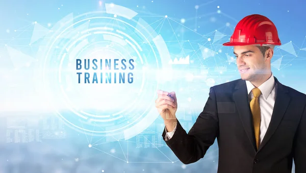 Handsome businessman with helmet drawing — Stock Photo, Image