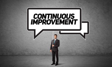 İş adamı, günlük trafik tabelasında.