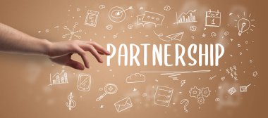 İşletme yazıtlarına işaret eden kırpılmış elin yakın çekimi