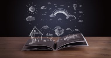 Elle çizilmiş peyzaj ile açık kitap 