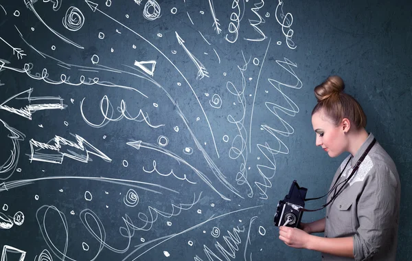 Photographer shooting images while energetic hand drawn lines an — Stock Photo, Image