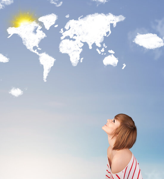 Young girl looking at world clouds and sun on blue sky