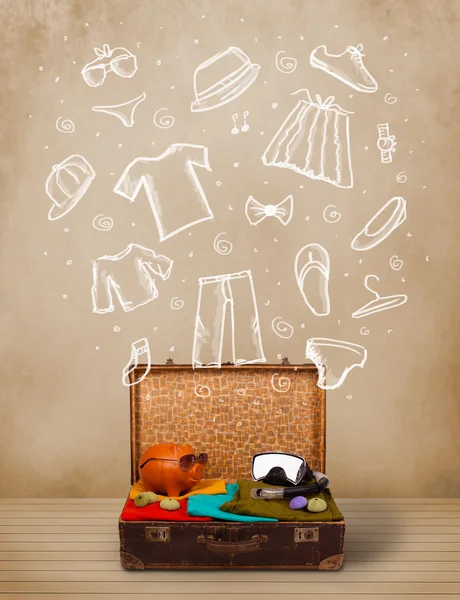 Traveler luggage with hand drawn clothes and icons — Stock Photo, Image