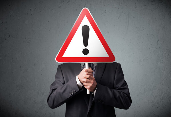 Бизнесмен с восклицательным знаком
