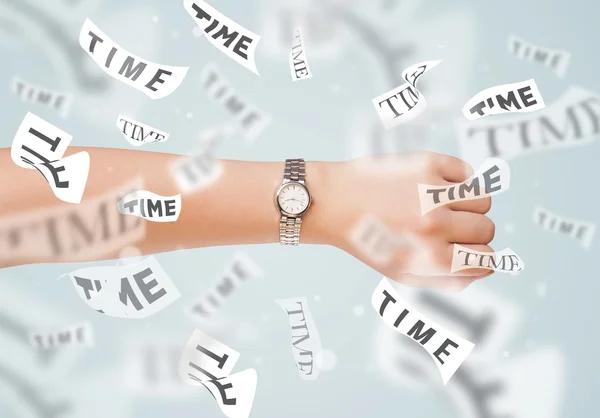 Clock and watch concept with time flying away — Stock Photo, Image