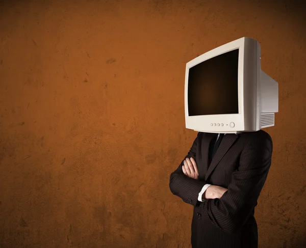 Business man with a monitor on his head and brown empty space — Stock Photo, Image