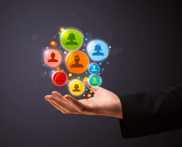 Social network icons in the hand of a businessman — Stock Photo, Image