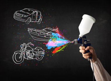 Man with airbrush spray paint with car, boat and motorcycle draw clipart