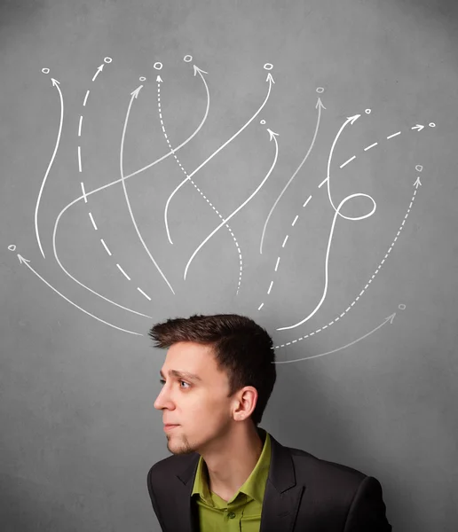 Businessman with arrows coming out of his head — Stock Photo, Image