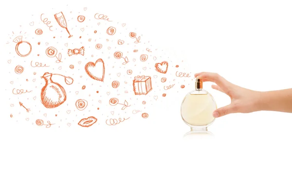 Sketches coming out from beautiful perfume bottle — Stock Photo, Image