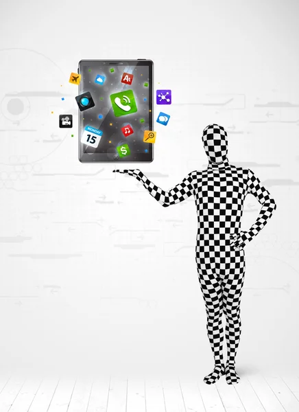 Man in full body suit holdig tablet pc — Stock Photo, Image