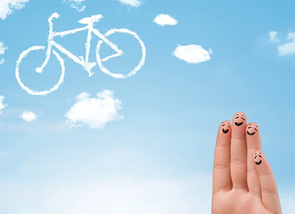 Felices dedos sonrientes mirando una nube en forma de bicicleta — Foto de Stock