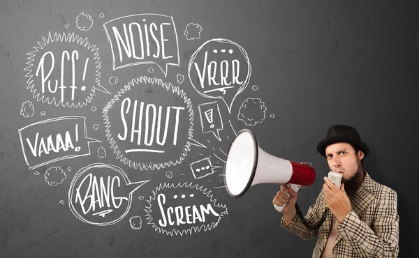 Guy in suit yelling into megaphone and hand drawn speech bubbles — Stock Photo, Image