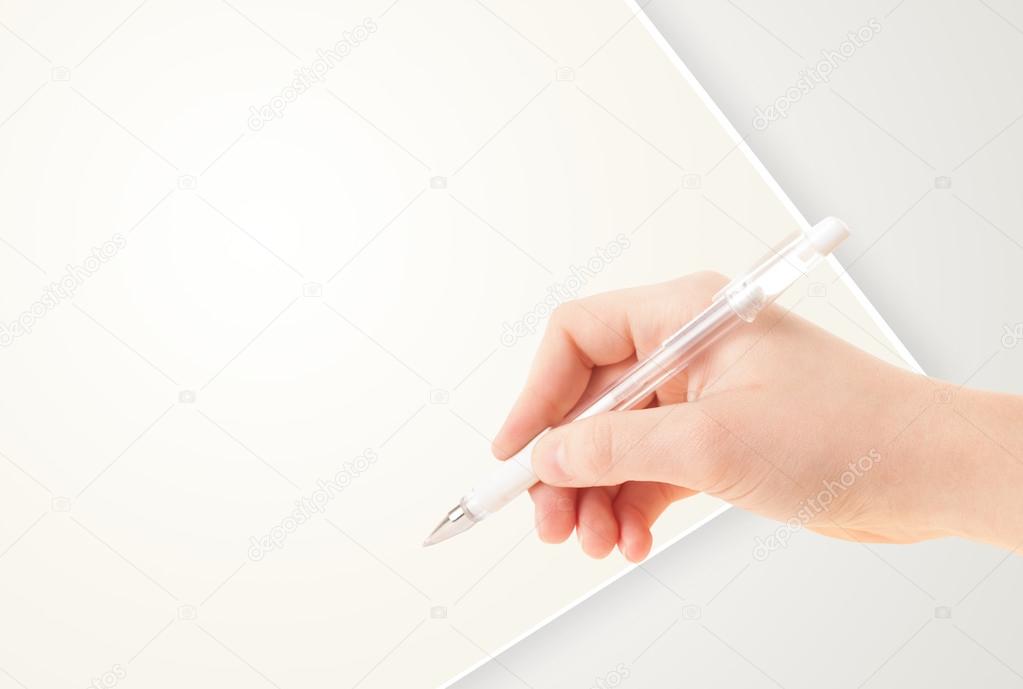 Hand writing on plain empty white paper copy space