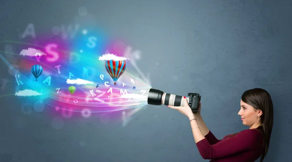 Photographer with camera and abstract imaginary — Stock Photo, Image