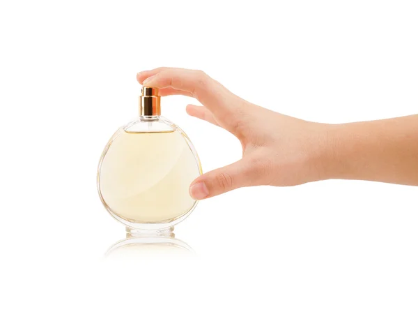 Vrouwenhanden spuiten parfum — Stockfoto