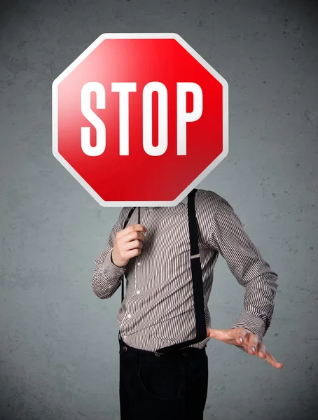 Üzletember stop táblával — Stock Fotó