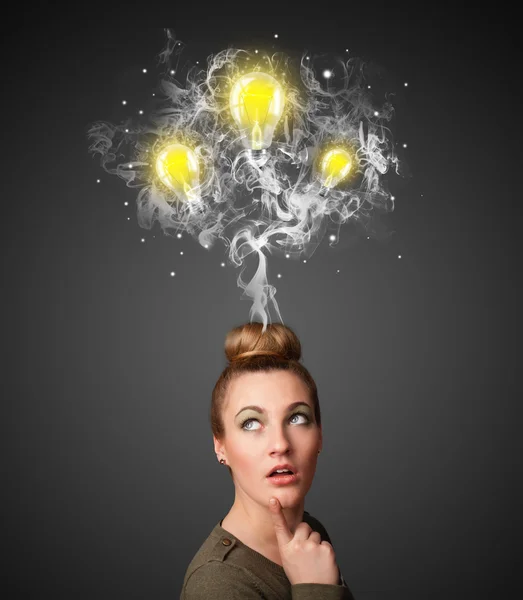 Thoughtful woman with smoke and lightbulbs above her head — Stock Photo, Image