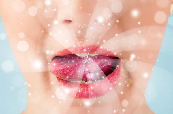 Pretty woman lips blowing abstract white lights — Stock Photo, Image