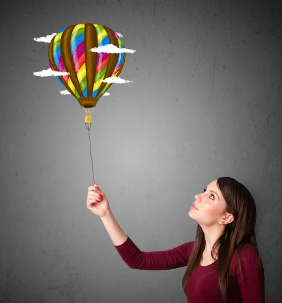 Woman holding a balloon drawing — Stock Photo, Image