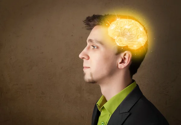 Man thinking with glowing brain illustration — Stock Photo, Image