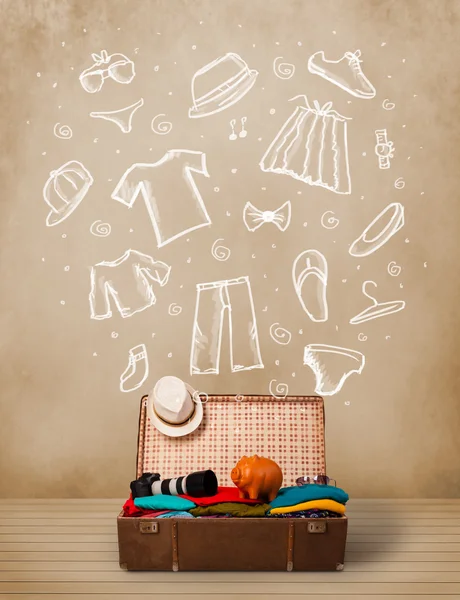 旅行者の荷物を持つ手描き下ろしの服とアイコン — ストック写真
