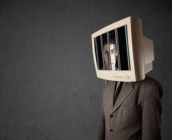 Business man with monitor on his head traped into a digital syst — Stock Photo, Image